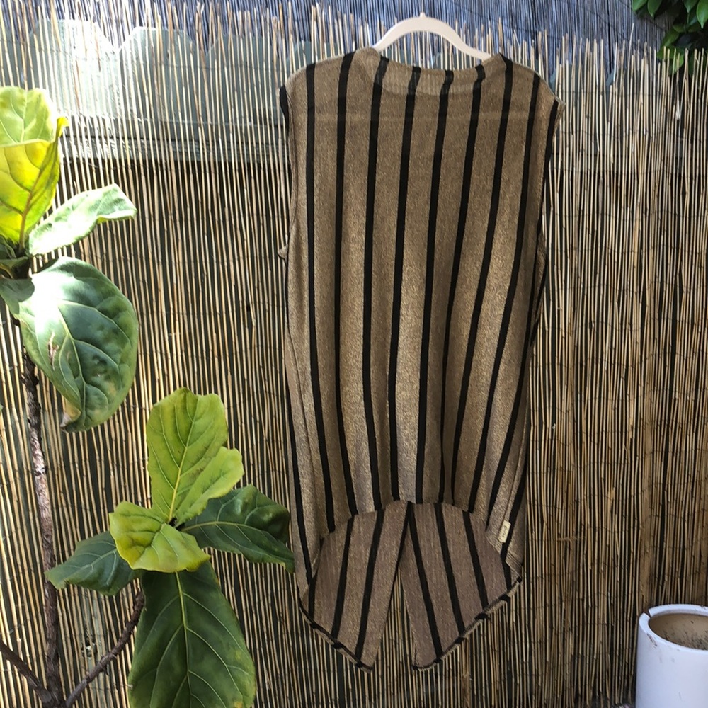 Glorka lurex top. Overlaps/ties on one side, and can be worn front or back.